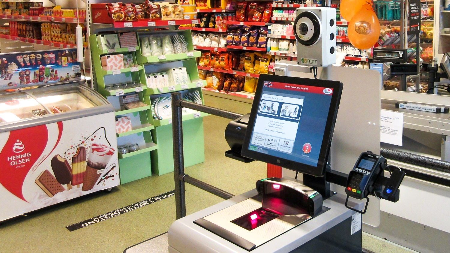 Ubemannet kasse i en butikk.